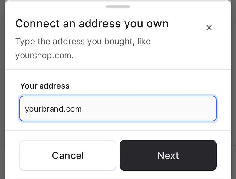 The Connect an address you own screen with yourbrand.com typed in the Your address box